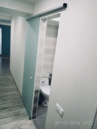 Стеклянные раздвижные двери